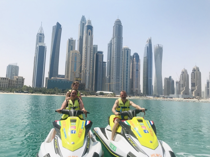 2 customers during a jet ski stop at Dubai Marina